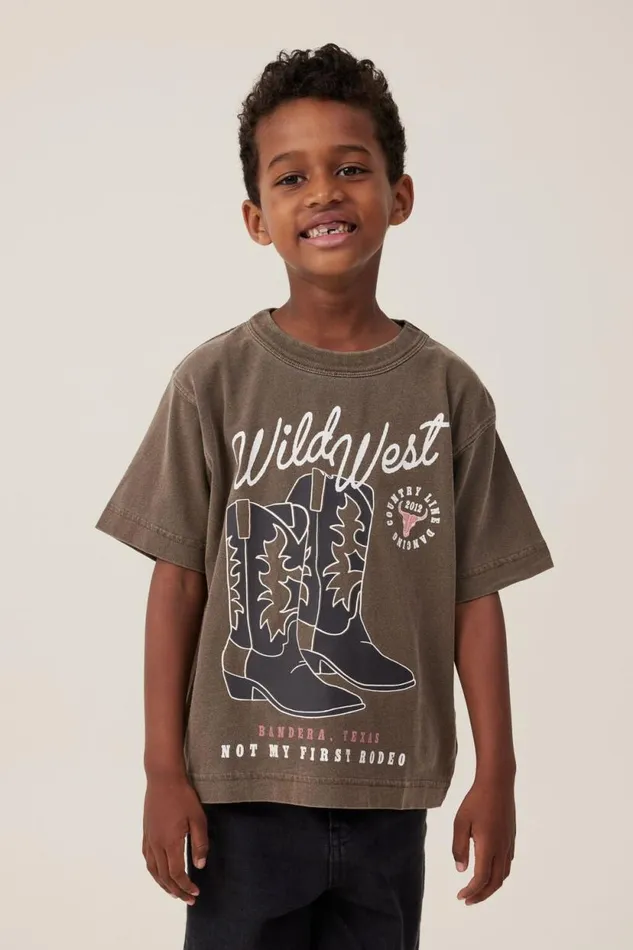 Jonny Short Sleeve Print Tee Hot Choccywild West Boys Cotton On Tops and TShirts Jonny Short Sleeve Print Tee Hot Choccywild West Boys Cotton On Tops and TShirts
